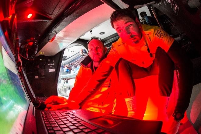 Simon 'SiFi' Fisher and skipper Ian Walker look at the latest AIS readings  during Leg 7 of the Volvo Ocean Race from USA to Portugal - Volvo Ocean Race 2015 © Matt Knighton/Abu Dhabi Ocean Racing
